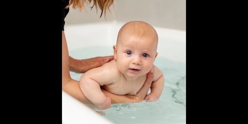 a baby in a bathtub