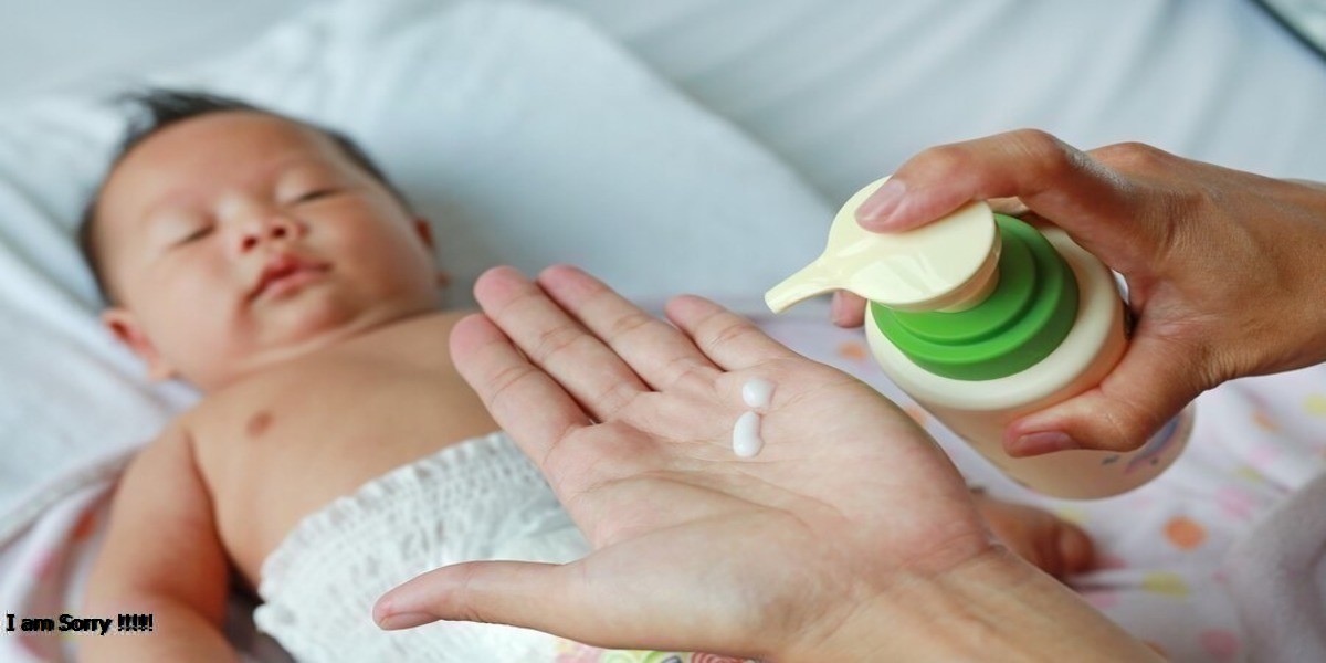 a baby being sanitized by a hand